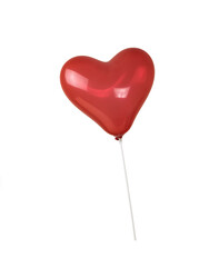 Inflatable red heart on a stick isolated on a white background.