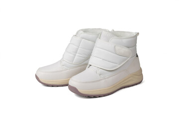 Insulated white women's sneakers with Velcro insulated on a white background