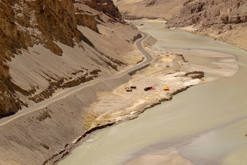 Fototapeta na wymiar Indus river flowing through rocks of Ladakh, union territory, Ladakh, India