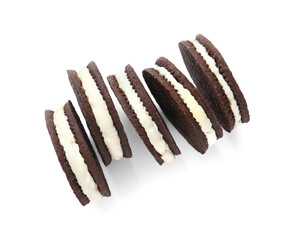 Tasty chocolate cookies with cream on white background