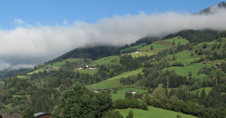Fototapeta premium Morning fog in Austrian alpine village