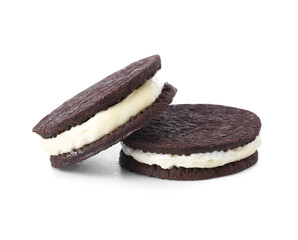 Tasty chocolate cookies with cream on white background