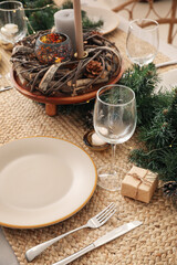 Dining table with beautiful setting for Christmas celebration indoors