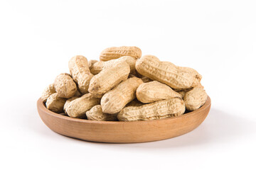 Dried peanuts in closeup isolated on white background