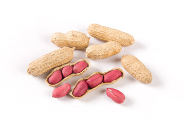 Dried peanuts in closeup isolated on white background