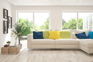 White living room with sofa and summer landscape in window. Scandinavian interior design. 3D illustration