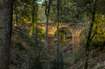Aqueduct "De Can Vilallonga" , touched by the sun rays, Catalonia, Spain.
