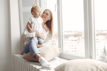 Young mother spends time with her daughter.