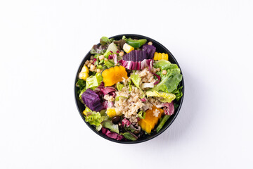 Fresh organic vegetables salad with quinoa seed in bowl on white background, Healthy Vegan food, Top view