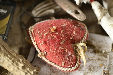 old rag heart in wood workshop