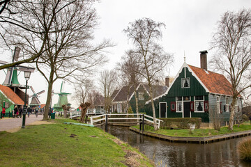 Europe, Netherlands, Zaanse Schans. Village houses along canal.