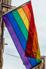 Pride flag on Warmoesstraat red light, Amsterdam, Holland, Netherlands.