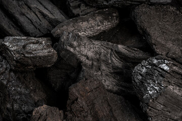Natural wood charcoal on background, Black charcoal texture background.
