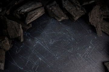 Natural wood charcoal on Black background, Black charcoal texture background.