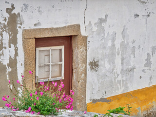 Portugal, Obidos. Graphic buildings inside the White walled town