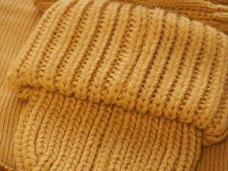 a set of warm yellow clothes. hat mittens and scarf