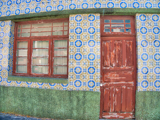 Portugal, Costa Nova. Colorful houses Palheiros striped homes