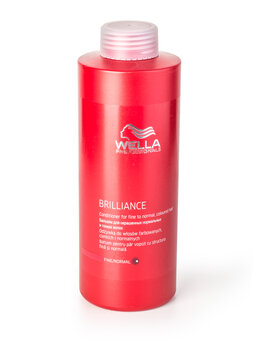 Tube of Wella isolated on white.