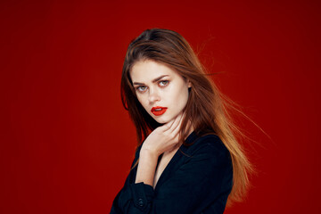 Fototapeta premium red-haired woman with red lips posing hairstyle glamor