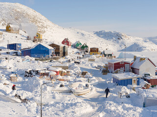The traditional and remote Greenlandic Inuit village Kullorsuaq located at the Melville Bay, in the far north of West Greenland, Danish territory - obrazy, fototapety, plakaty