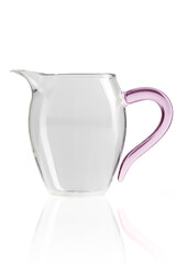 Detailed shot of glass transparent kettle. Tableware has a pink handle. Kettle with smooth surface is isolated on the white background.