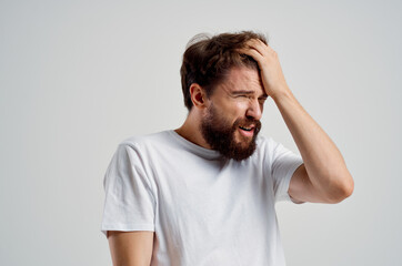 Obraz premium emotional man health problems migraine stress disorder isolated background