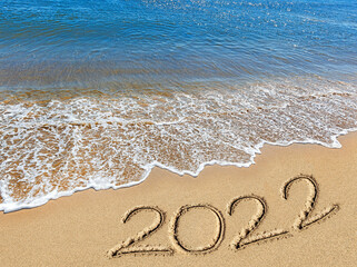 sea, sky, clouds, sand, footprints, inscription 2022,