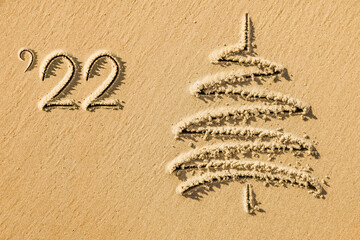 images christmas tree in the sand
