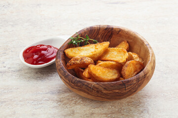 Fried rustic potato with tomato ketcup