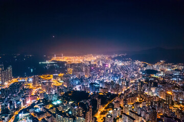 Obraz premium cyberpunk mood of the aerial night cityscape, Kowloon, Hong Kong