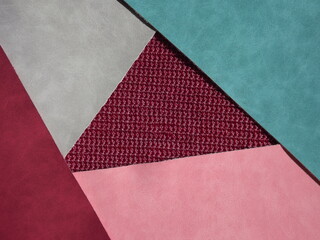  red, burgundy, blue, gray geometric shapes as background, knitting middle