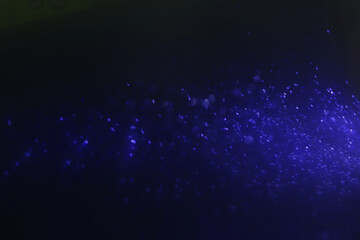 Fototapeta na wymiar background of abstract blue and black glitter lights. defocused