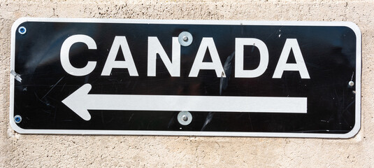 ‘Canada’ sign on the US-Canada border