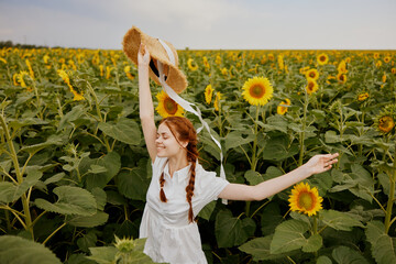 woman with two pigtails in a field of sunflowers lifestyle countryside