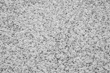 black and white pebble stones as a background texture
