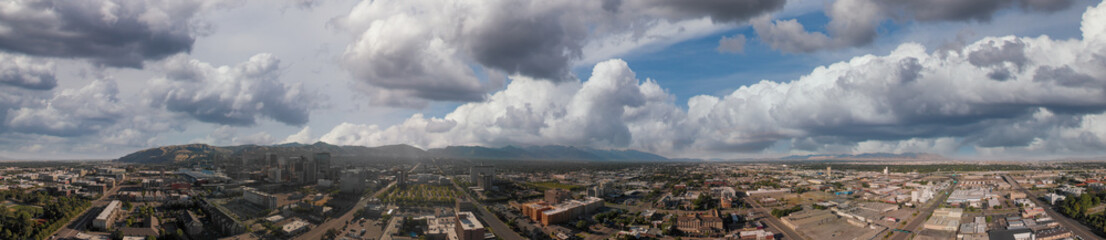 Salt Lake City aerial skyline on a sunny day, Utah from drone at sunset