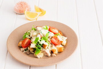 Healthy food concept: caesar salad