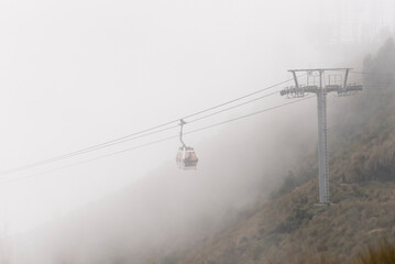 Ecuador, Quito. TeleferiQo cable car on Pichincha Volcano rises to 13,000 ft. one of tallest in...