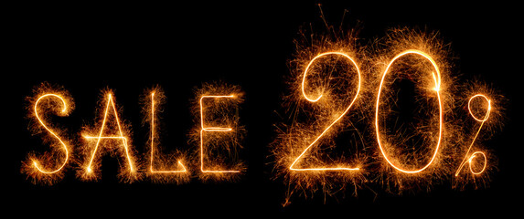 Sale 20%. Discount written in bright sparklers isolated on black background