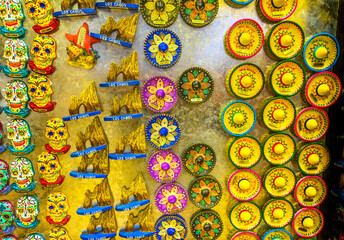 Colorful Mexican magnets sombreros Day of the Dead handicrafts, Cabo San Lucas, Mexico