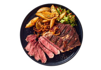 Appetizing steak and potatoes on plate
