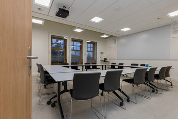 Maastricht, Netherlands  11-17-2021 flexible classroom at a university. Due to desk chairs and wheels under the table, students can easily change the set up of a room during a meeting in Maastricht