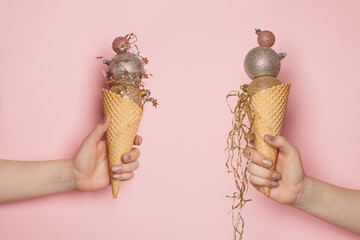 Christmas decoration background. Xmas waffle cone ice cream with Christmas ball decor