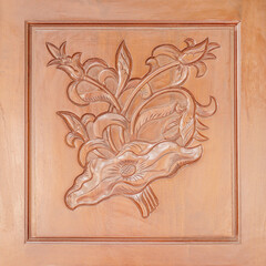 Hand carved wood flower ornament texture or Wood carving Buddhism style decoration at temple of Thailand