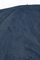 Couple on top of the volcano with hiking zigzag track