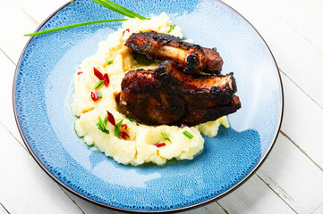 Fried meat with mashed potatoes