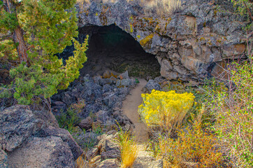 USA, California. Lava Beds National Monument, Hercules Leg Cave entrance