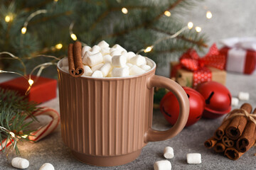 Obraz na płótnie Canvas Hot winter drink. Hot chocolate with marshmallow with fir and decoration. New Year. Christmas.