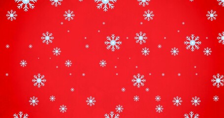 Digitally generated image of snowflakes pattern with copy space on red background