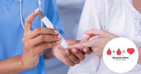 Doctor using glucometer on woman's index finger at hospital with blood donation symbol